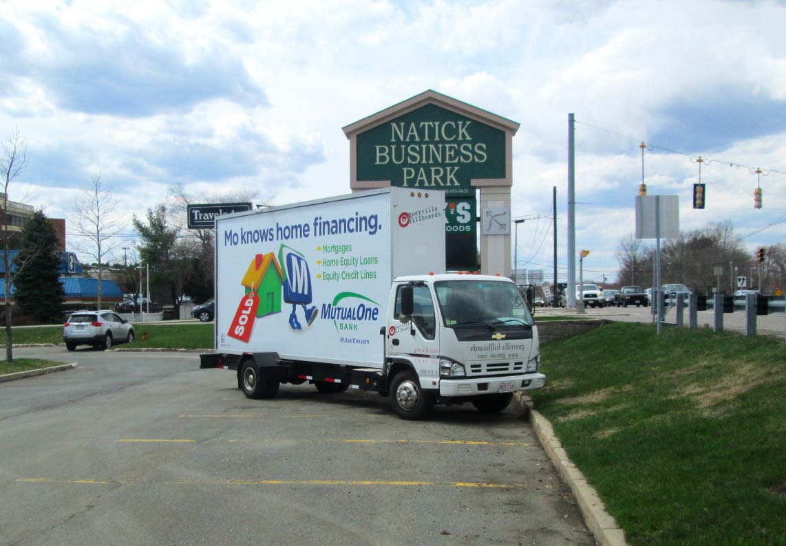 Mobile billboard promoting mortgages and home equity loans near Boston.