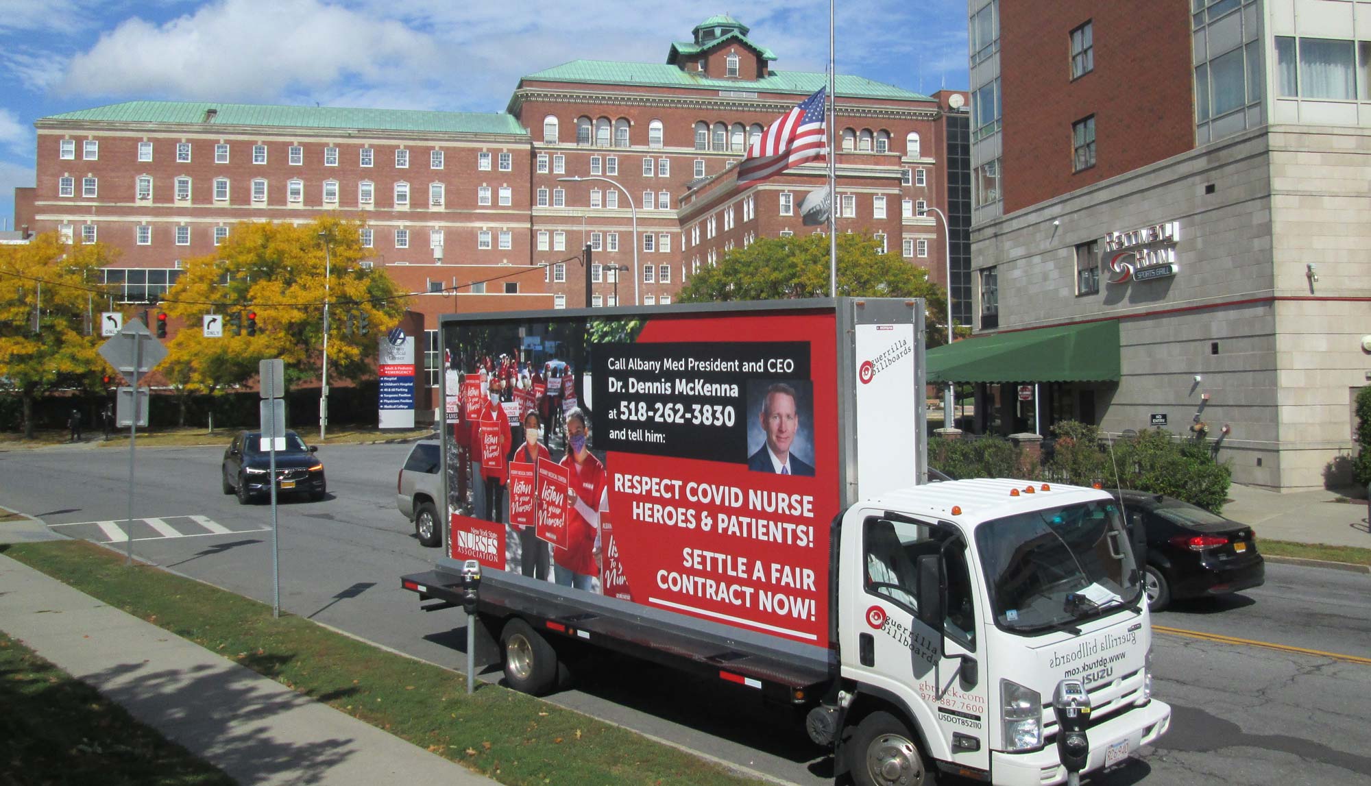 Mobile billboard ad promoting contract settlement for NYSNA