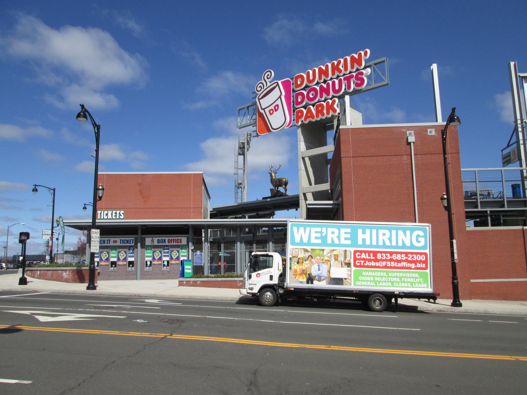 We're Hiring ad on a billboard truck in Hartford CT