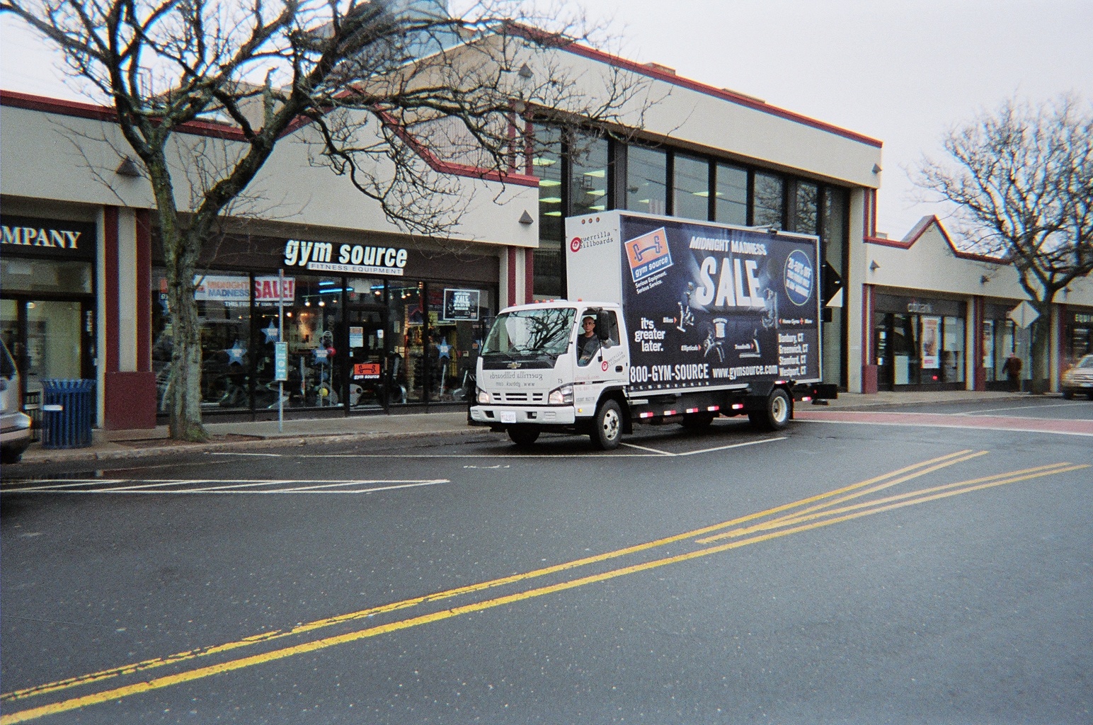 Gym Source - Midnight Madness Sale Billboard Ad - Greenwich CT