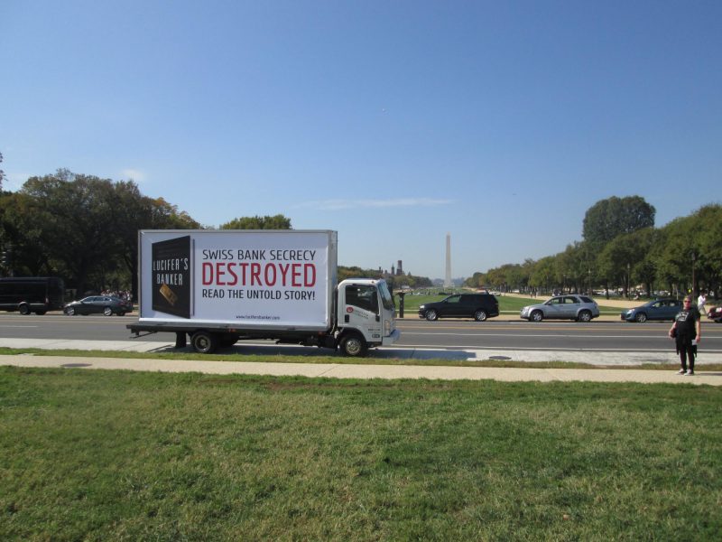 Billboard truck driving along The Mall in Washington DC