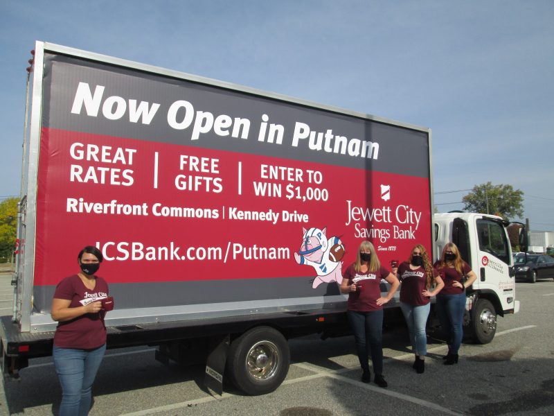 Mobile billboard promoting a new bank branch in CT.
