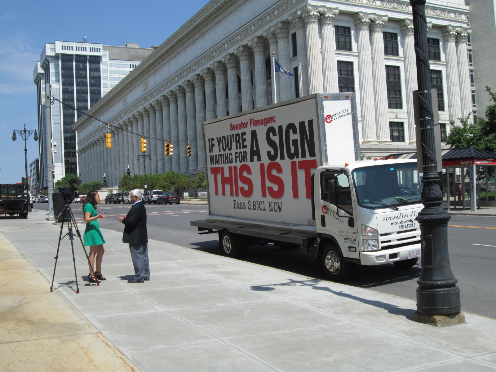 2018 NYSUT mobile billboard serving as a TV news interview backdrop in Albany NY