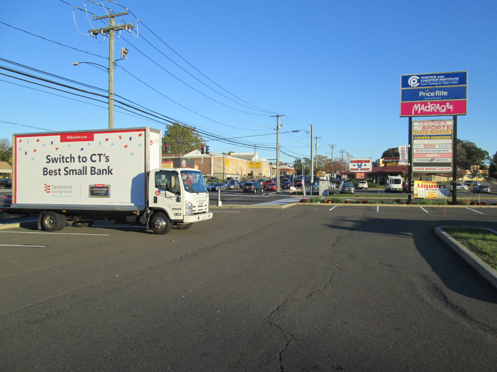 Mobile billboard stopped along Boston Avenue in Bridgeport CT.