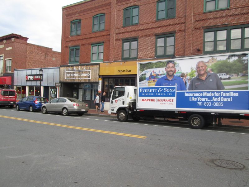 Mobile billboard truck stopped on Moody Street in Waltham MA