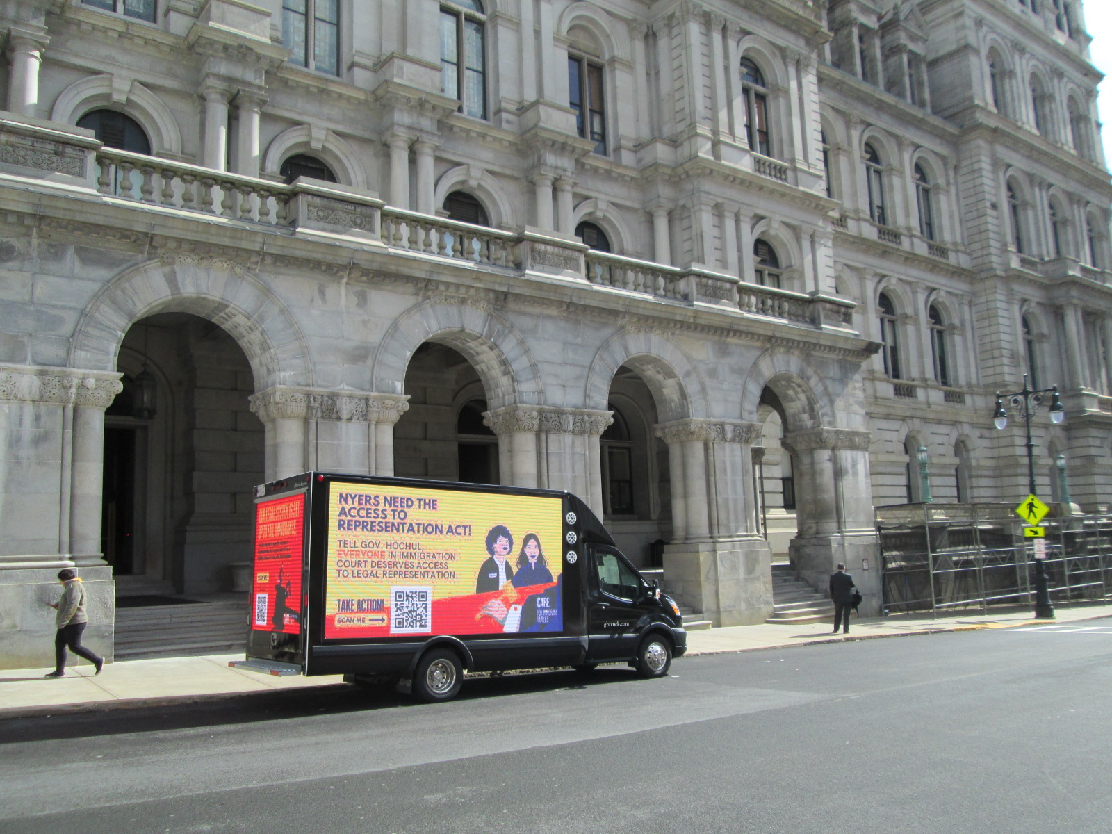LED Digital mobile billboard truck stopped on State Street at the iconic New York State Capitol building, Albany, NY