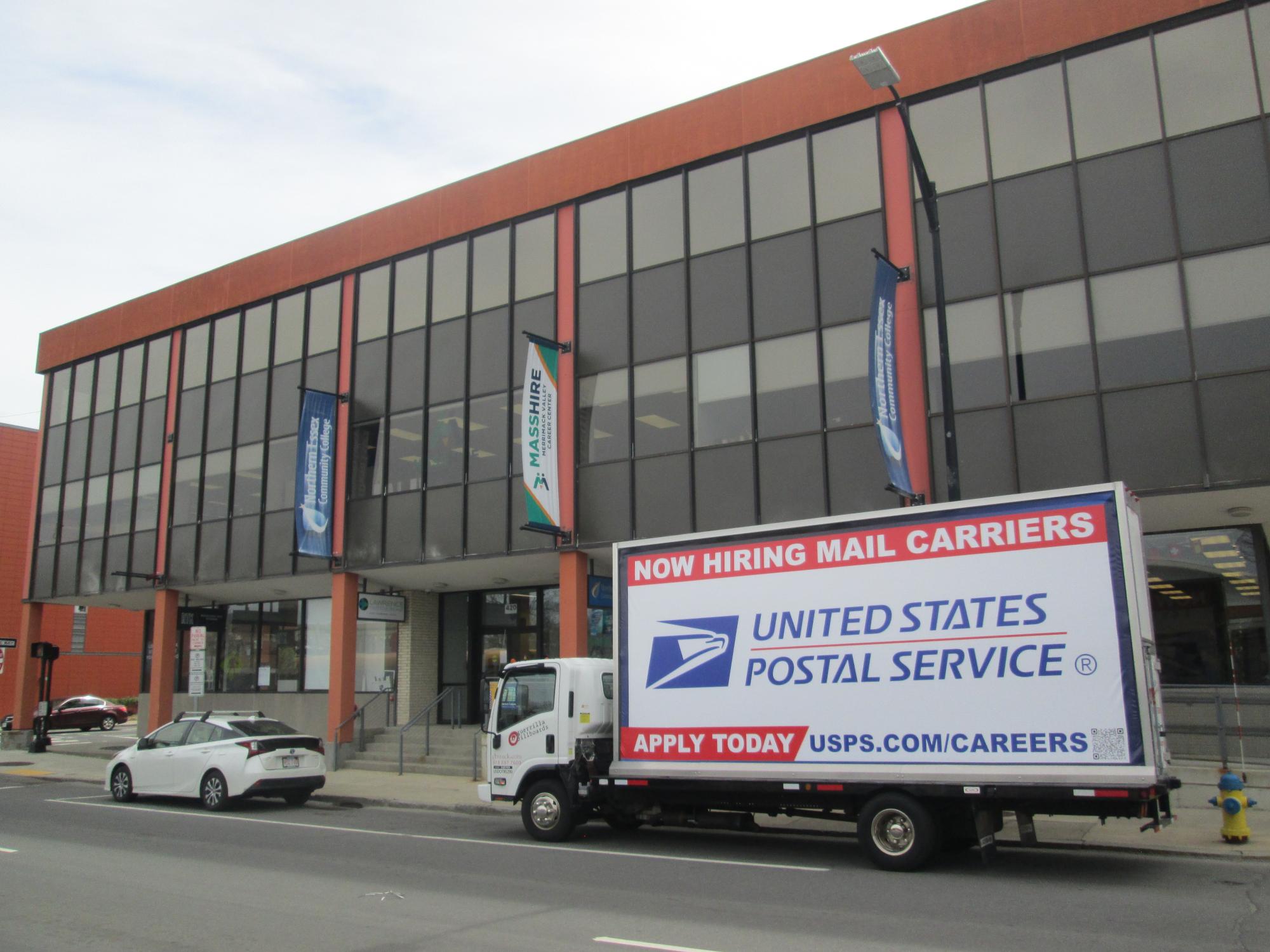 Mobile billboard truck stopped at the Mass Hire Career Center in Lawrence MA.