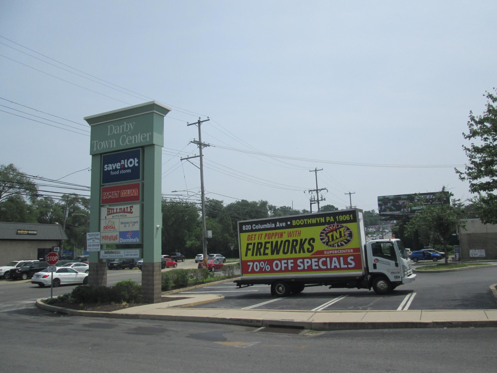 Mobile billboard truck stopped in Darby PA, July 2023.