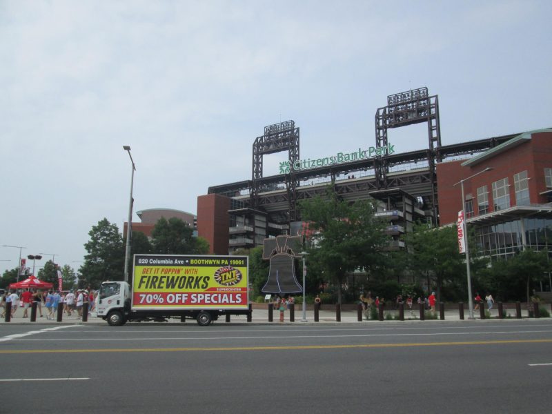 Mobile billboard truck stopped in front of Citizen's Bank Park in Philadelphia, PA.