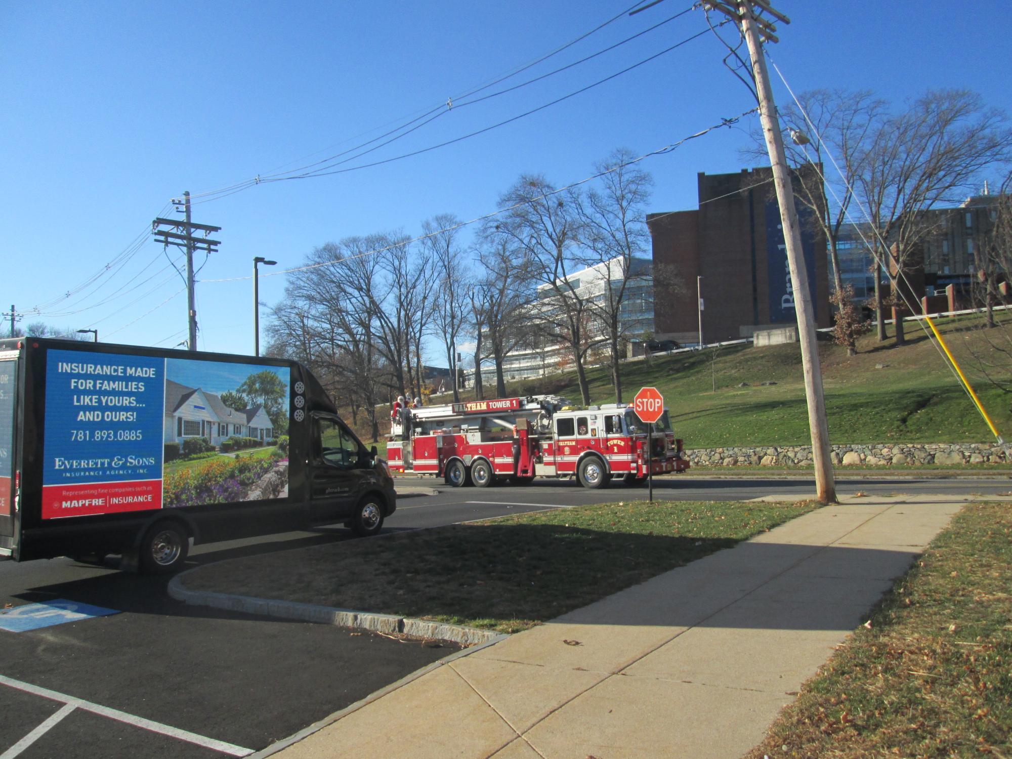 LED mobile billboard truck waiting to join a holiday parade in Waltham MA