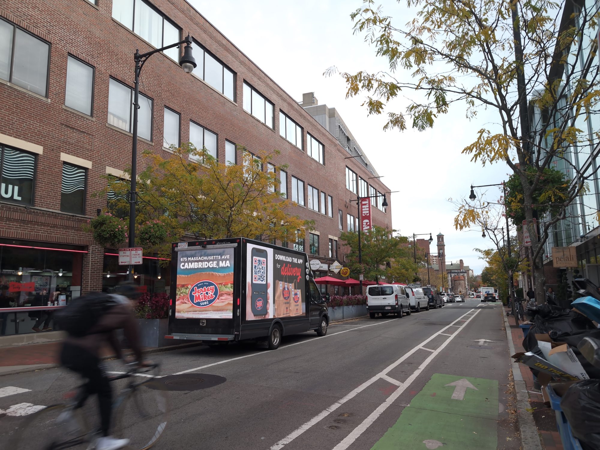 LED mobile billboard truck stopped near Harvard Square in Cambridge MA.