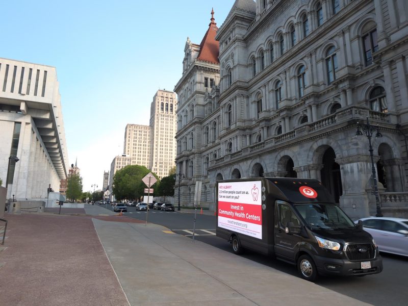 Mobile digital billboard truck with a public awareness parked on State Street in Albany NY