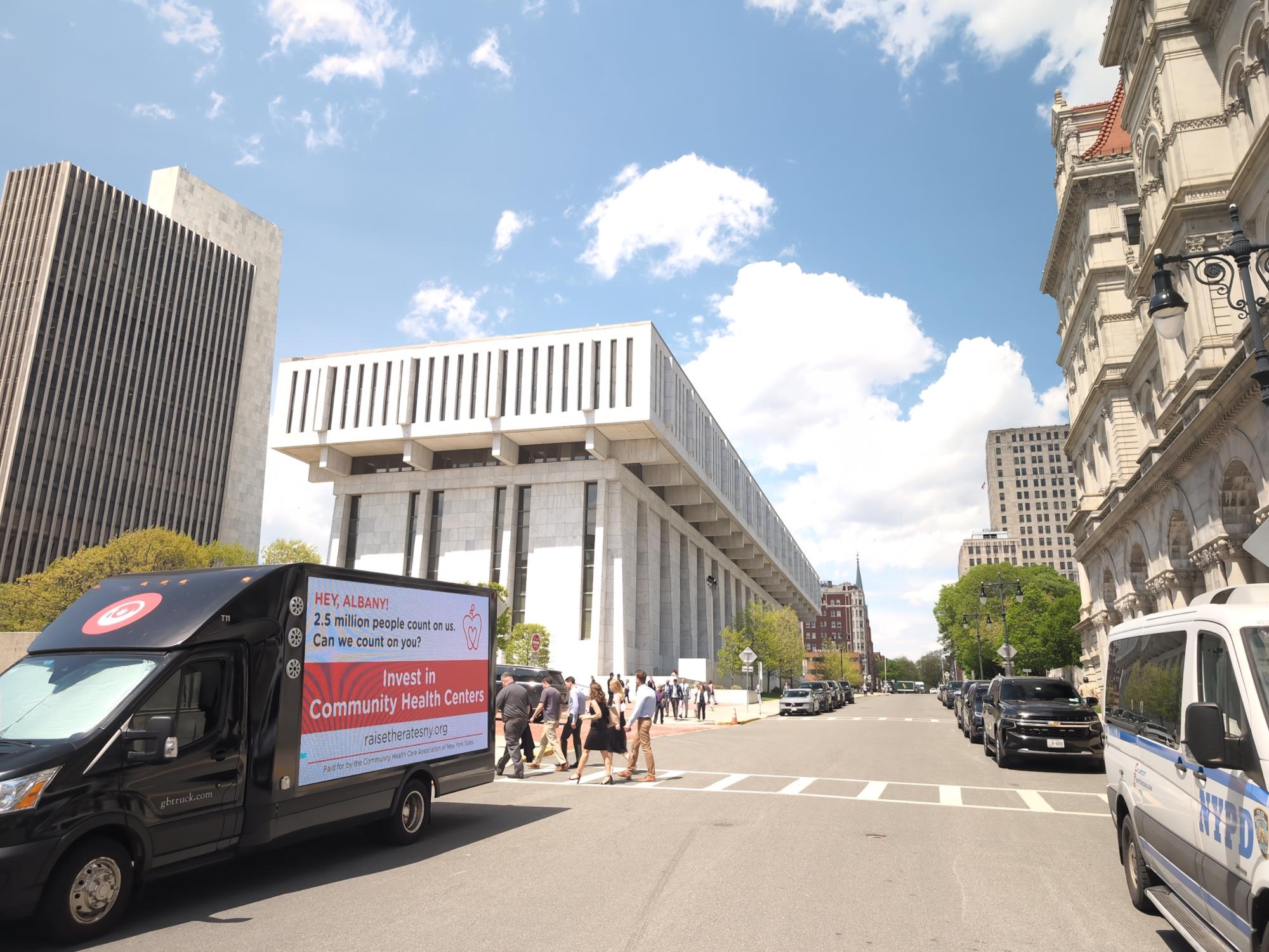 Digital mobile billboard truck with a public awareness message in Albany NY