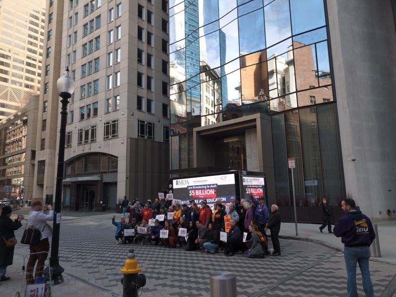 Mobile digital billboard truck supporting protesters in the Financial District, Boston MA