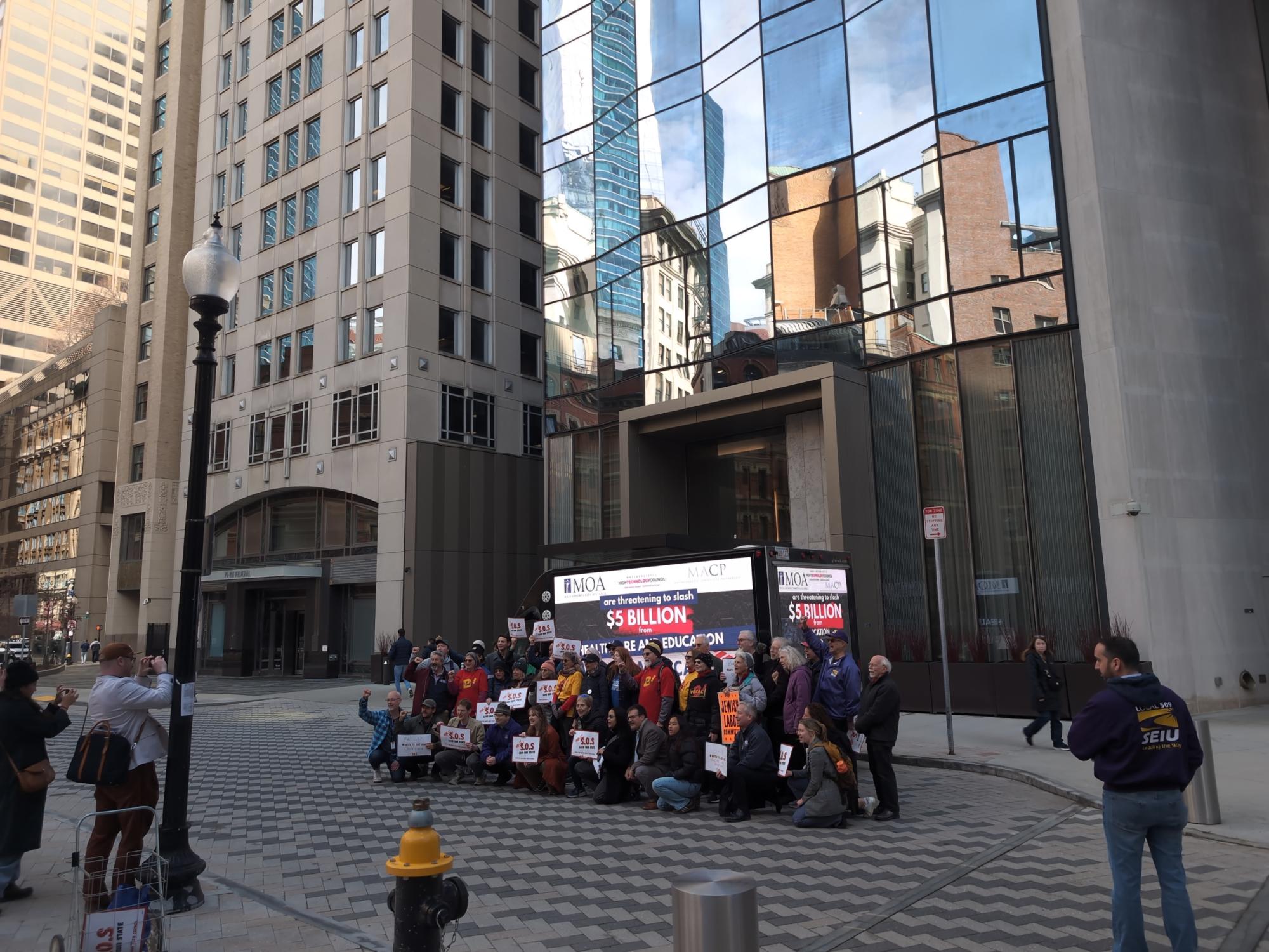 Mobile digital billboard truck supporting protesters in the Financial District, Boston MA