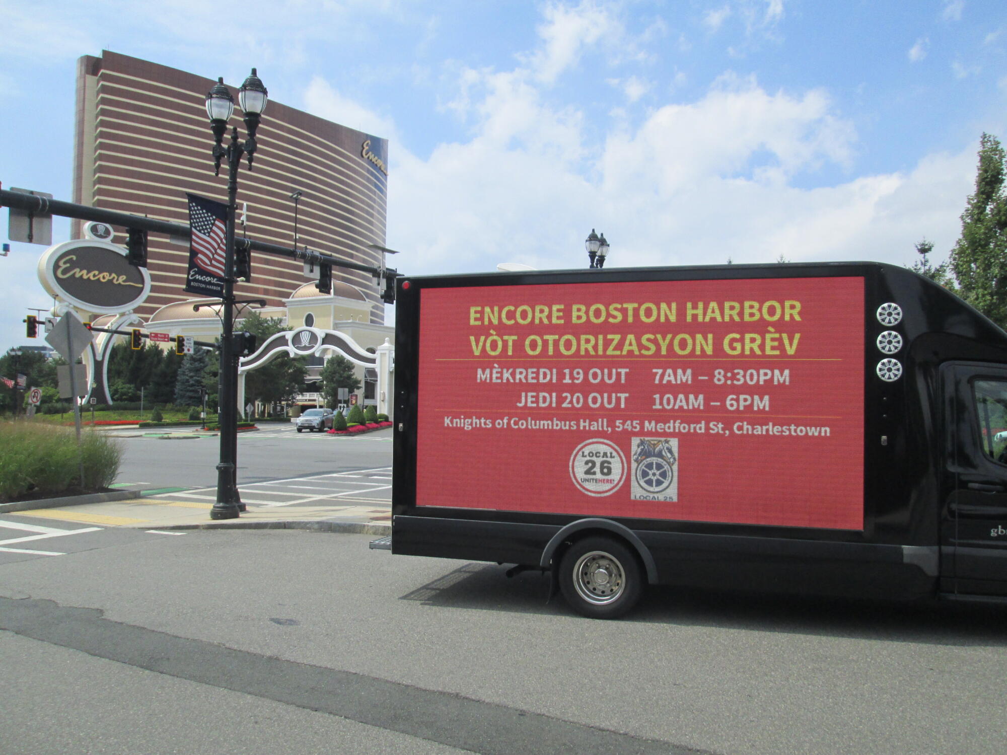 Boston area labor union's LED mobile billboard strike vote awareness message in Haitian Creole.