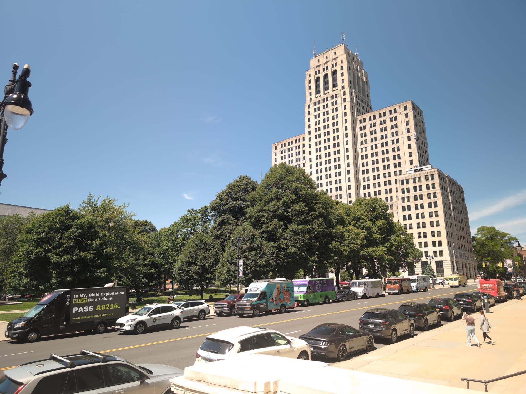 Mobile digital billboard truck parked on Washington Avenue at West Capitol Park in Albany NY