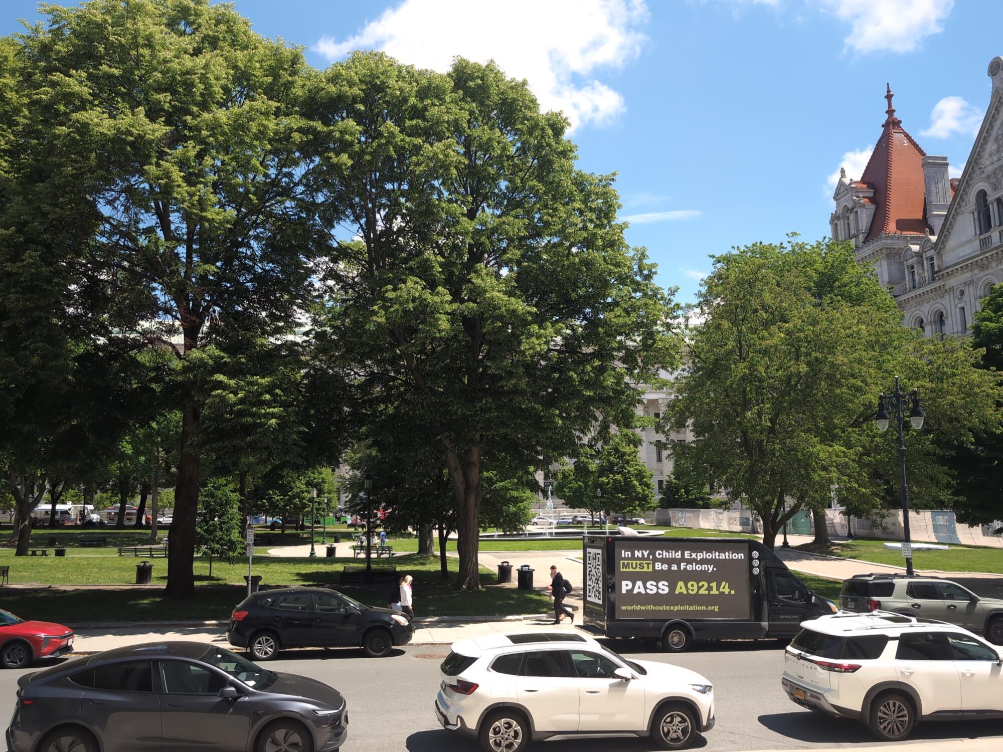 LED mobile billboard truck parked on State Street at the New York State Capitol building in Albany NY.