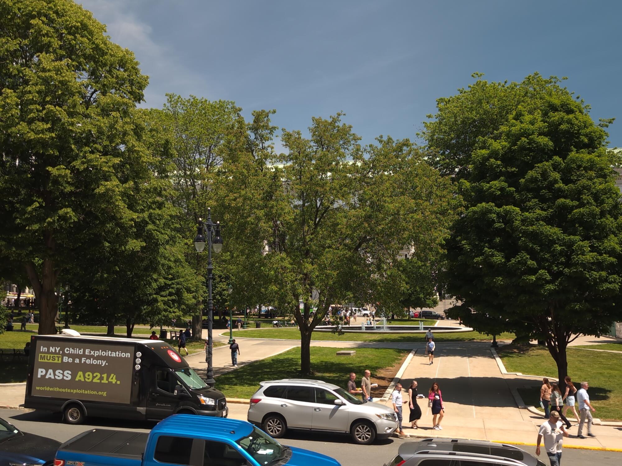 Digital mobile billboard truck parked on State Street at West Capitol Park in Albany NY.