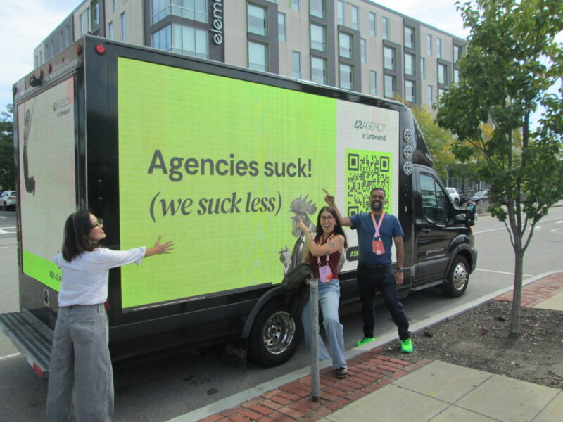 Client meet-up with its digital mobile billboard truck ad during the HubSpot Unbound 2026 conference in Boston MA.