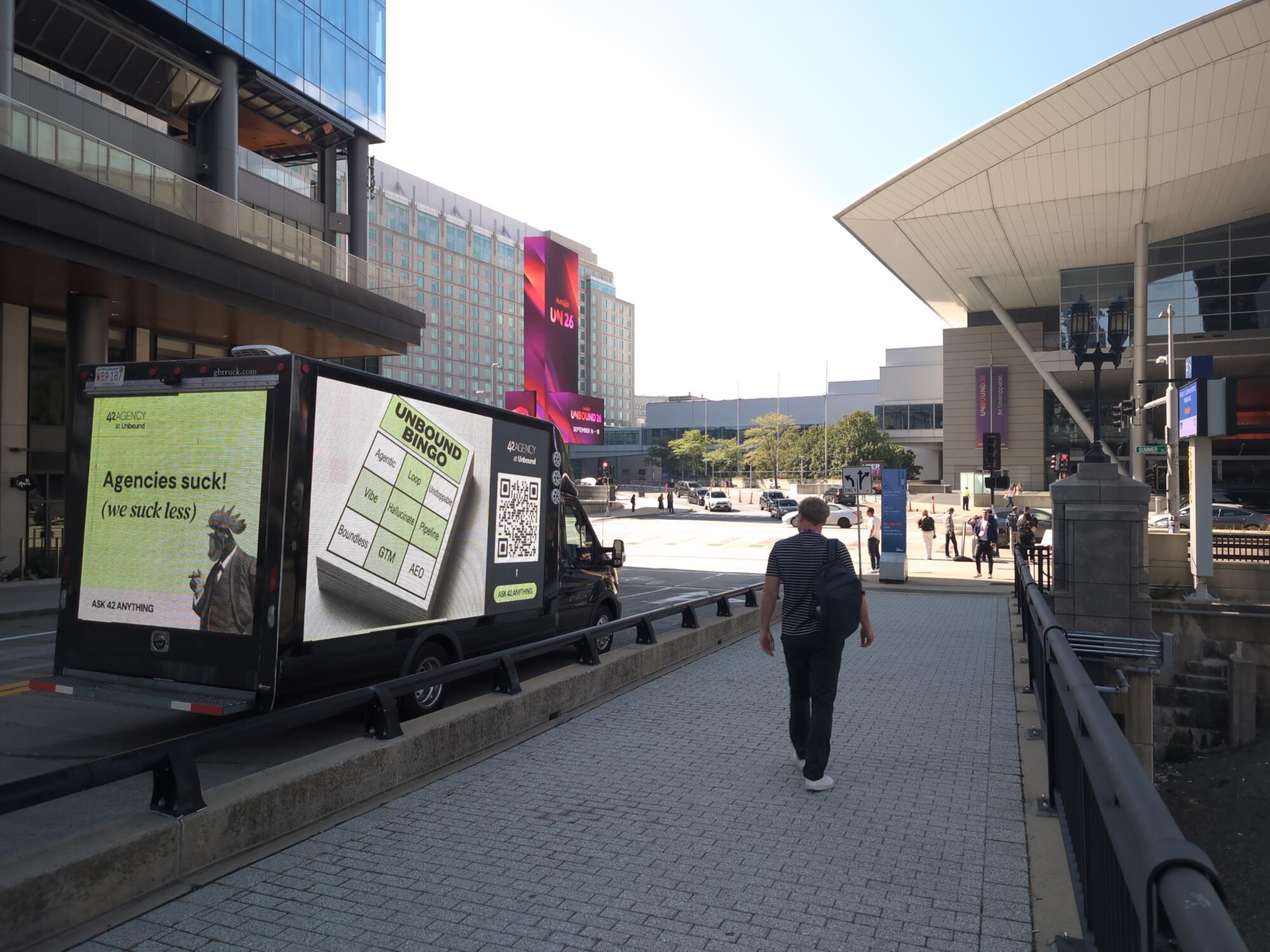 LED Digital style mobile billboard truck ad viewed by people attending a convention in Boston MA.